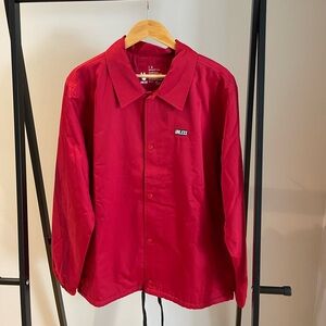 Unless Collective Unisex Red Coaches Jacket - Womens L/Mens M.